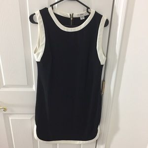 Black dress with white piping